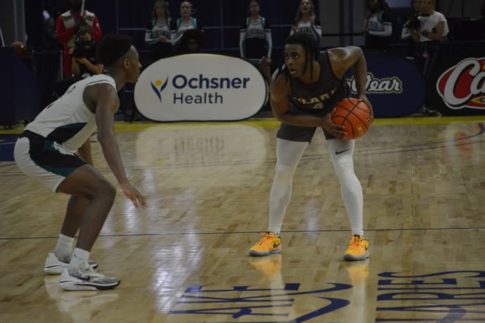 JS Clark junior Lawrence Pickney (4) is guarded by Avoyelles Charter sophomore Armonii Benjamin in the Division V select championship game March 8, 2024.